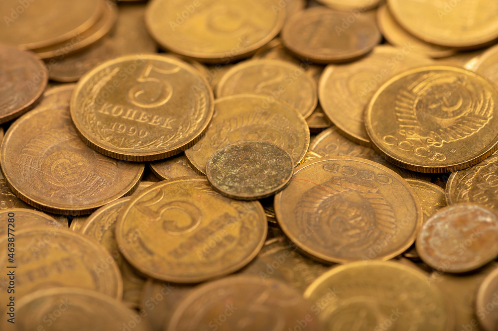Old coins out of circulation in bulk, background image, close-up, selective focus. Old coins out of circulation in bulk, background image, close-up, selective focus.
