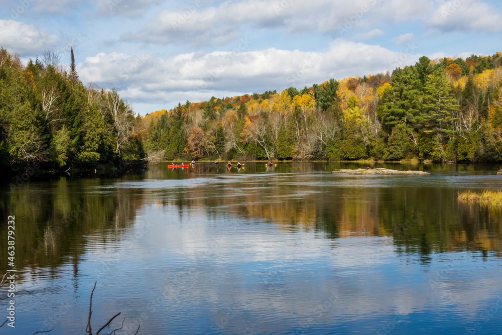 The Madawaska River on a fall day. This is an iconic whitewater canoeing destination in Eastern Ontario, Canada, where generations have come to learn to paddle. The Madawaska River on a fall day. This is an iconic whitewater canoeing destination in Eastern Ontario, Canada, where generations have come to learn to paddle.