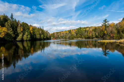 Fototapeta Naklejka Na Ścianę i Meble -  The Madawaska River on a fall day.  This is an iconic whitewater canoeing  destination in Eastern Ontario, Canada, where generations have come to learn to paddle.