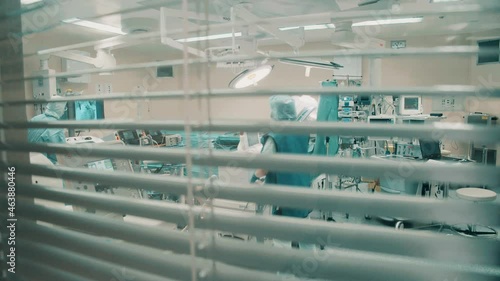 Operating theatre filmed through the blinds photo