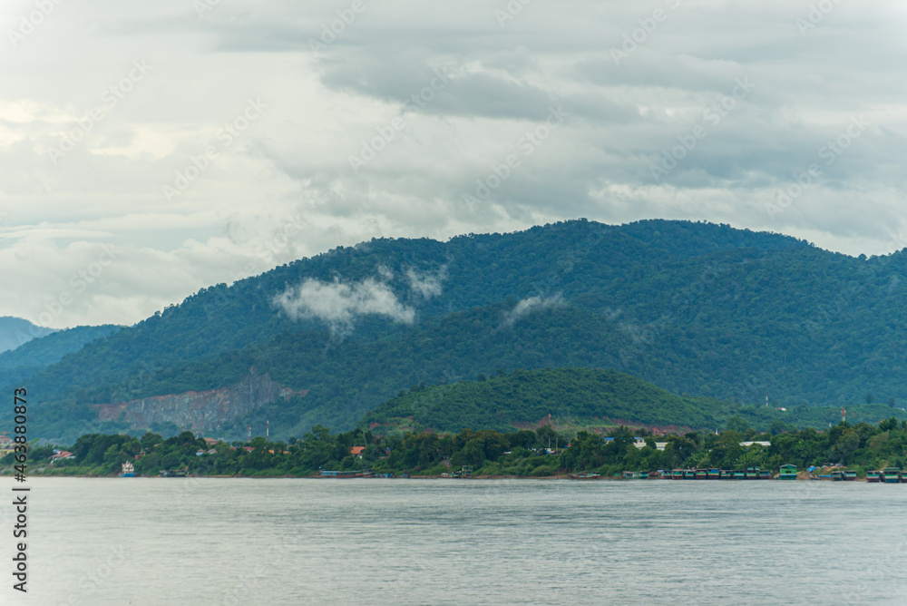 Mekong river with fog and mountain background.
