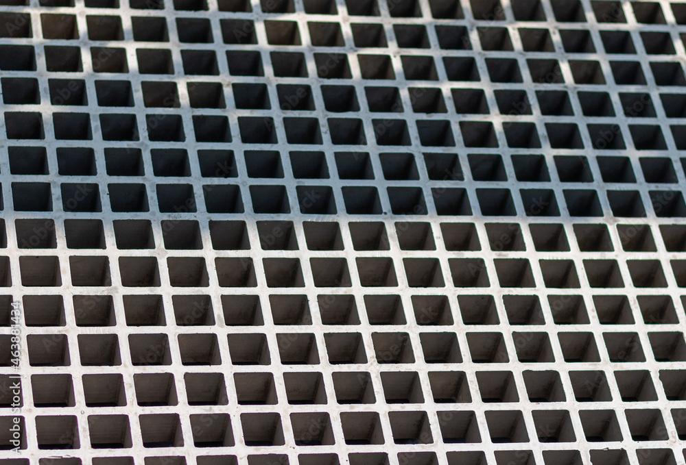 Mesh textured metal panel. Gray steel industrial surface Mesh textured metal panel. Gray steel industrial surface