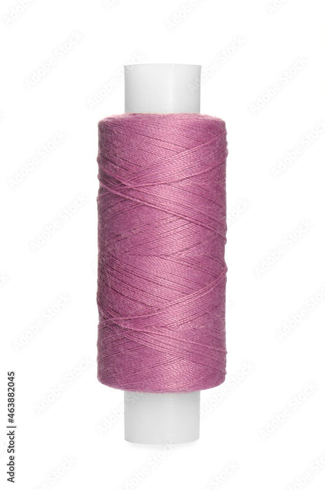 Spool of lilac sewing thread isolated on white Spool of lilac sewing thread isolated on white