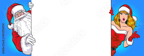Santa Claus and santa woman peeking white board