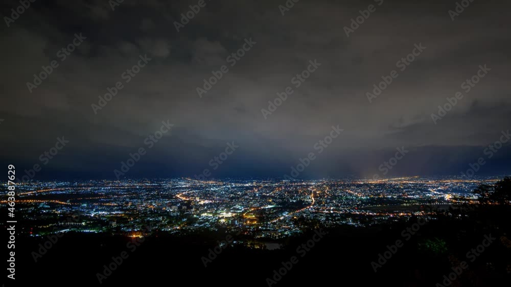 aerial view of night city from the view point on top DOi SUTHEP mountain in cloudy day , Chiang mai ,Thailand aerial view of night city from the view point on top DOi SUTHEP mountain in cloudy day , Chiang mai ,Thailand
