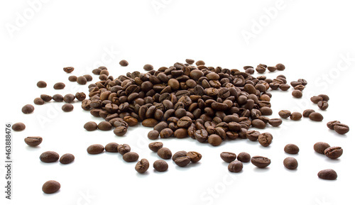 Scattered coffee beans isolated on white background.