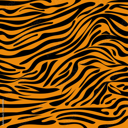 Seamless pattern with tiger skin. Black and orange tiger stripes. Popular texture. Animal skin print. Safari background.Vector illustration