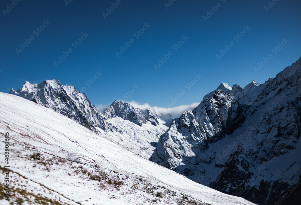 Mountain landscape in Dombay. Mountain view. Nature. Popular tourist attraction. Best famouse travel locations. Scenic Image of Russia. Winter mountains.