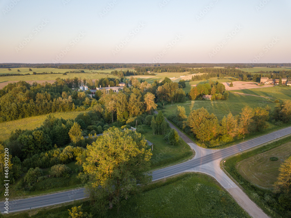 countryside roads in autumn colors with sunset light