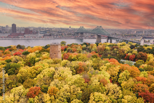 Spectacular aerial view of Montreal Jacque Cartier bridge with autumn leaves in background photo