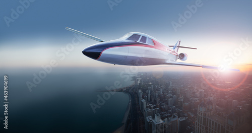 Small business jet plane fly over Chicago downtown