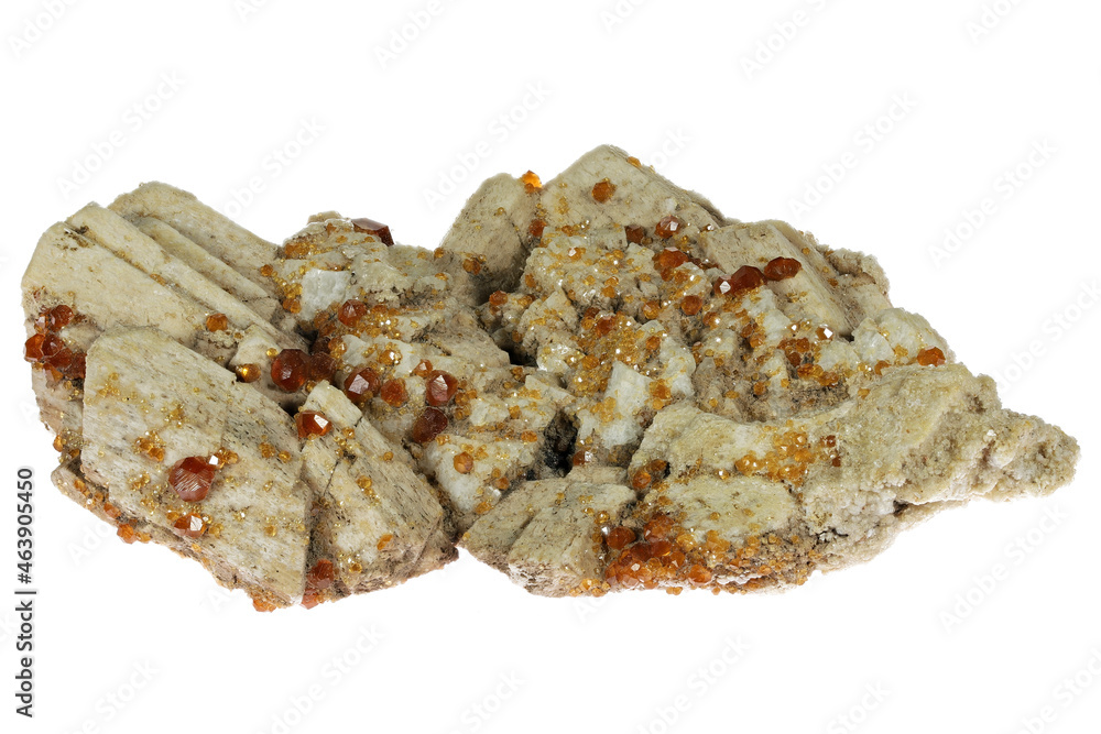spessartine on feldspar from Longchang, China isolated on white background spessartine on feldspar from Longchang, China isolated on white background