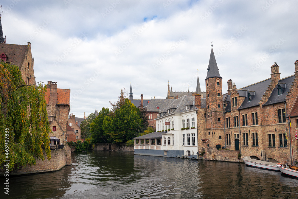 Scenic view of historic buildings, seen from Rozenhoedkaai, one of the most famous tourist attractions in the historic city of Bruges (Dutch: Brugge).