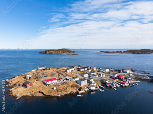 Houses on a small island in the sea © Bailey Parsons