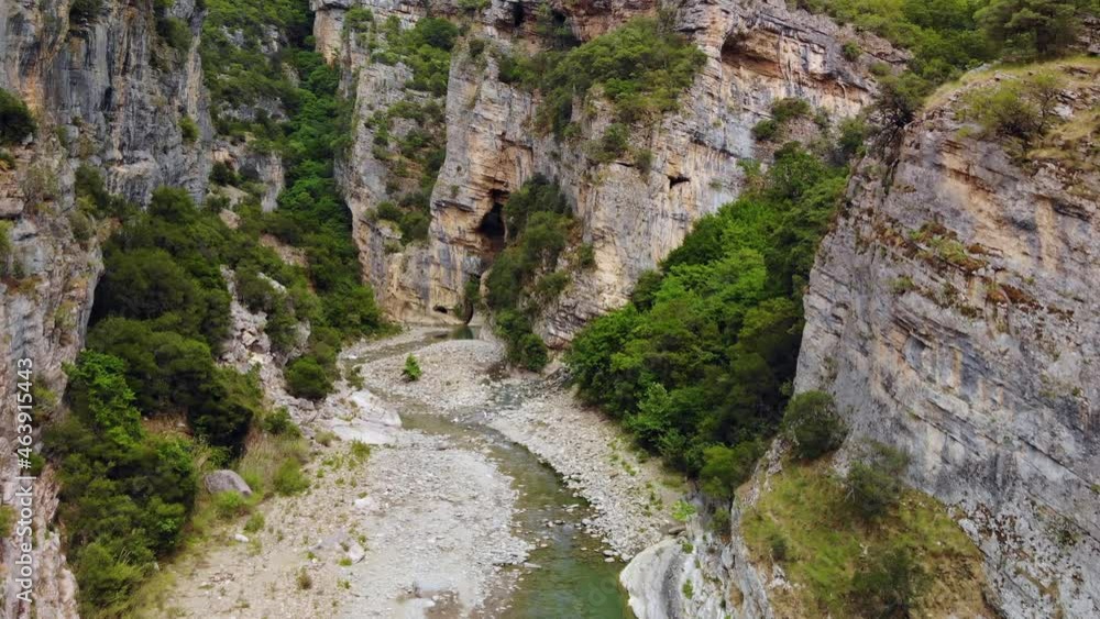 Flying on a drone over a river through a canyon in Albania. Permet hot springs. 4K UHD video. Flying on a drone over a river through a canyon in Albania. Permet hot springs. 4K UHD video.