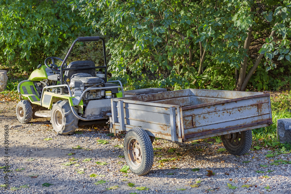 Small mobile tractor for landscaping gardens and parks Small mobile tractor for landscaping gardens and parks