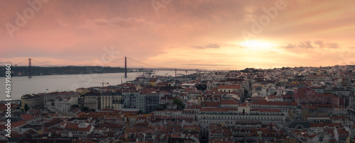Lisbon bridge at sunset from a viewpoint