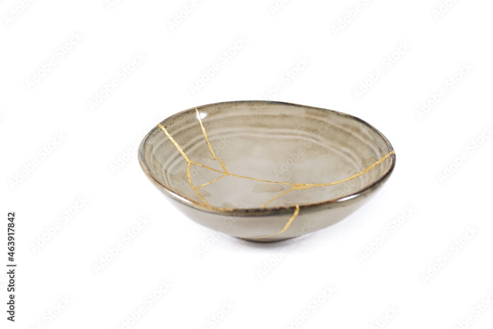 Antique Japanese Kintsugi, beige Kintsugi bowl restored with gold cracks. Wabisabi pottery Antique Japanese Kintsugi, beige Kintsugi bowl restored with gold cracks. Wabisabi pottery