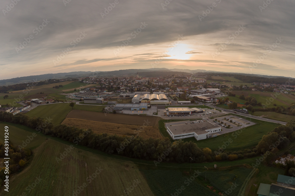 Aerial drone view of Lenart, a small town in the eastern part of slovenia at sunset in autumn.