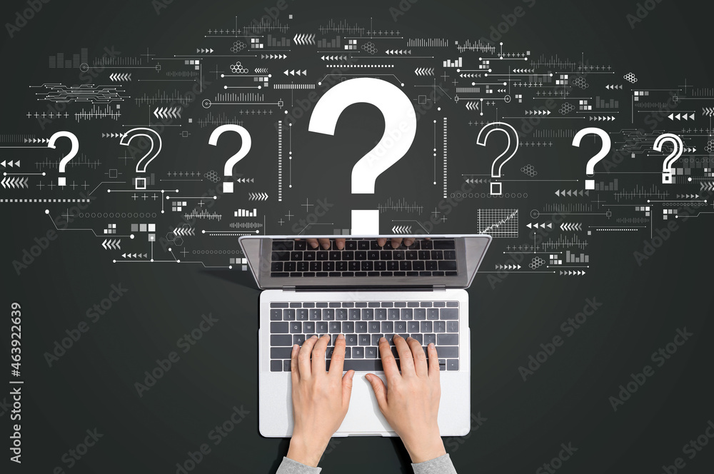 Question marks with person using a laptop computer - obrazy, fototapety, plakaty 