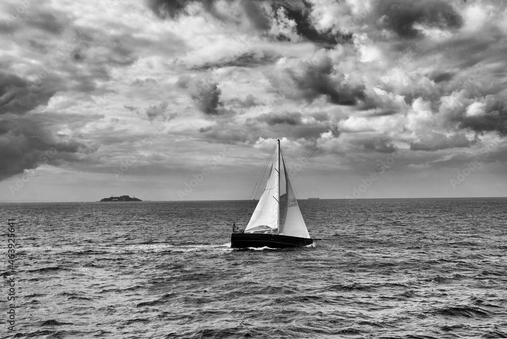 Black-white seascape. Sail to the sea.