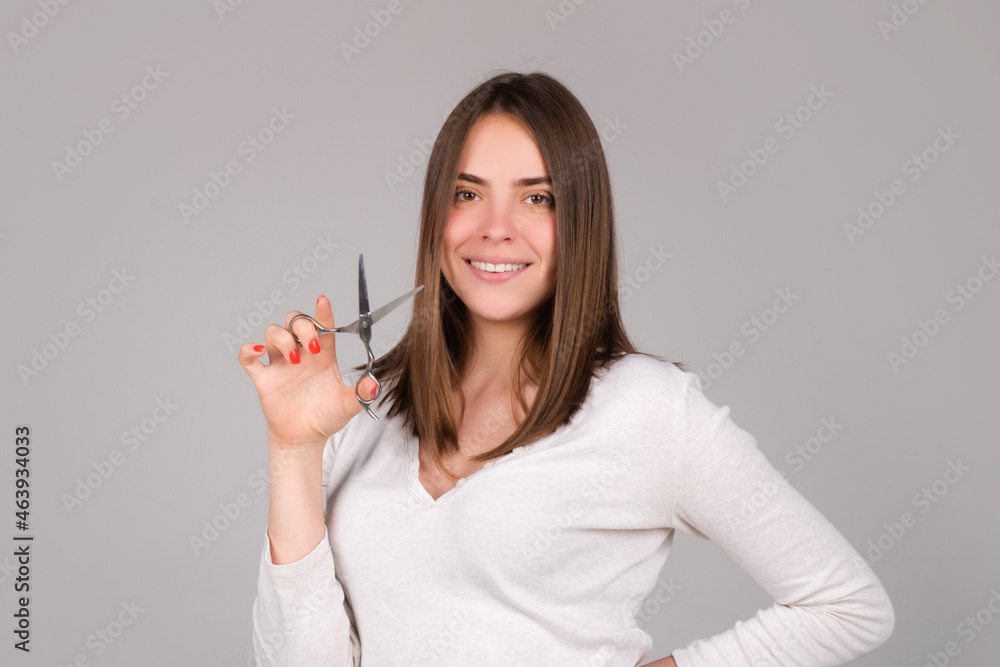 Woman with scissors having hair cut. Beautiful girl with straight hair with professional scissor. Woman with scissors having hair cut. Beautiful girl with straight hair with professional scissor.