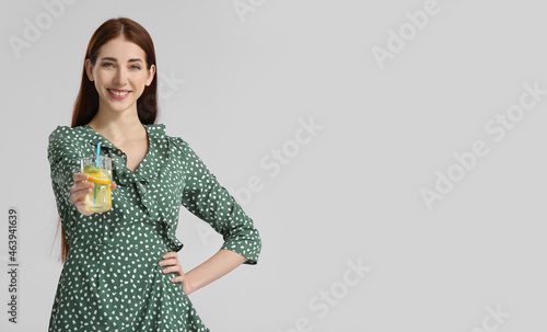Beautiful young woman with ...