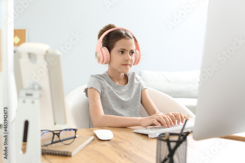 Cute little programmer usin...