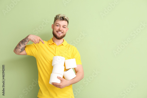 Young man with many rolls o...
