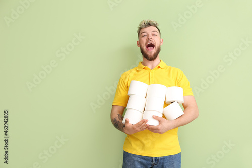 Happy young man with many r...
