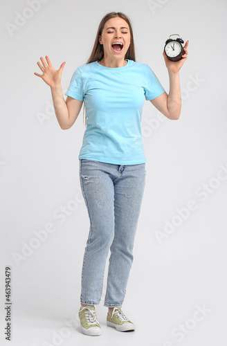 Screaming young woman with ...