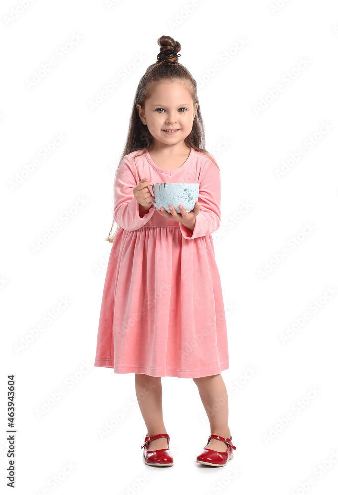 Adorable little girl with cup of hot cocoa on white background Adorable little girl with cup of hot cocoa on white background