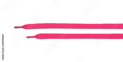 Pink shoe laces isolated on white background photo
