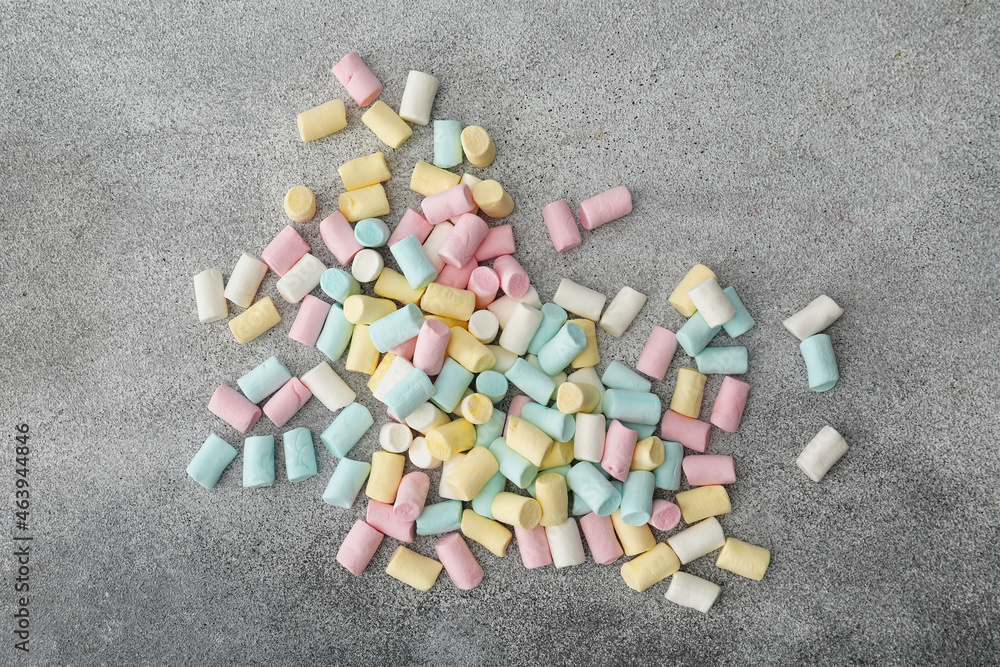 Tasty colorful marshmallows on grey background Tasty colorful marshmallows on grey background