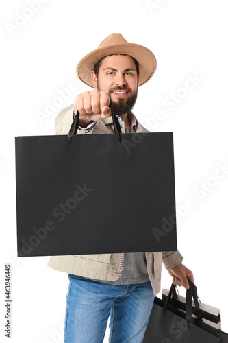 Smiling young man in a hat ...