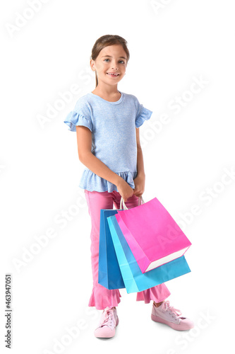 Little girl with Black Friday shopping bags on white background © Pixel-Shot