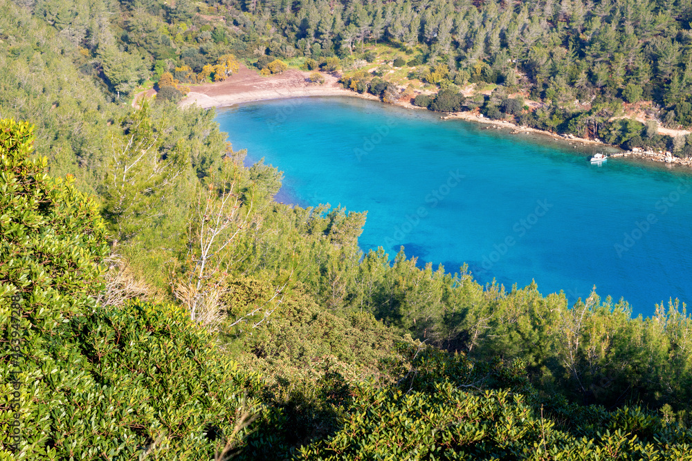 Close up photo of famous bay known as Cennet Koyu in Bodrum, Mugla, Turkey. Tourism and leisure concept. Close up photo of famous bay known as Cennet Koyu in Bodrum, Mugla, Turkey. Tourism and leisure concept.