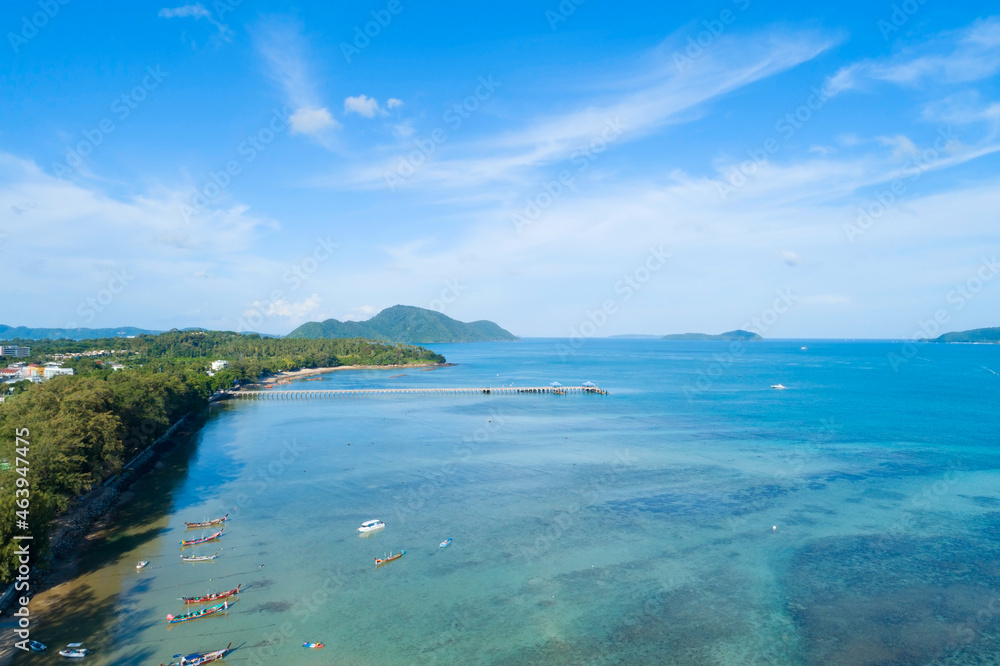 Aerial view drone shot of tropical sea at rawai beach Phuket Thailand Beautiful scenery andaman sea and small island in summer season Beautiful travel background and website design nature view