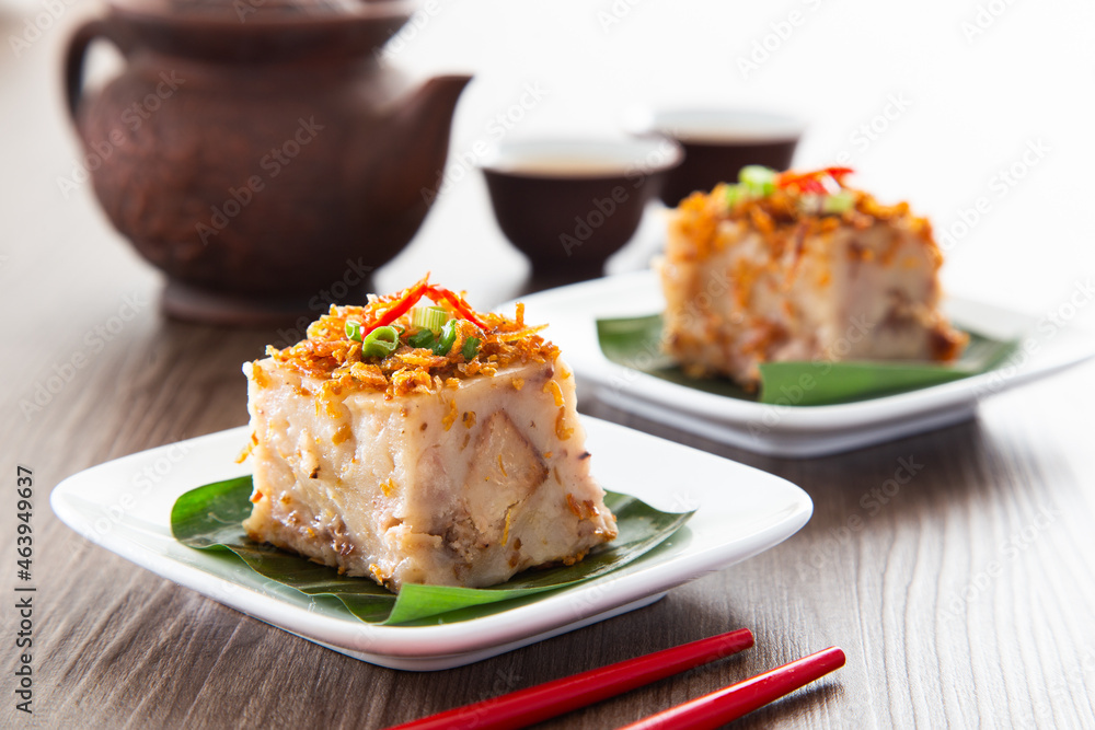 Steamed Yam Cake with Ground Deep-Fried Dried Shrimps Toppings. Chinese Cuisine Steamed Yam Cake with Ground Deep-Fried Dried Shrimps Toppings. Chinese Cuisine