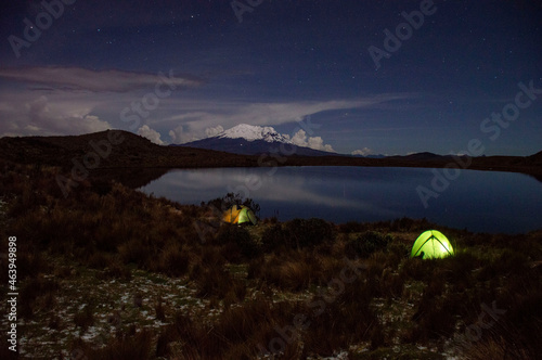 Night campsite in the mountain with close to a lake