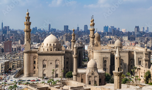 The Al-Rifai Mosque and the Sultan Hassan Madrasa and Mosque in Old Cairo, Egypt, with the towers behind in the distance