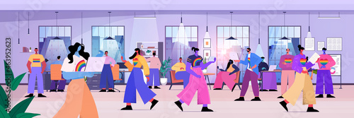 businesspeople working together in office lgbt rainbow flags gay lesbian transgender love concept