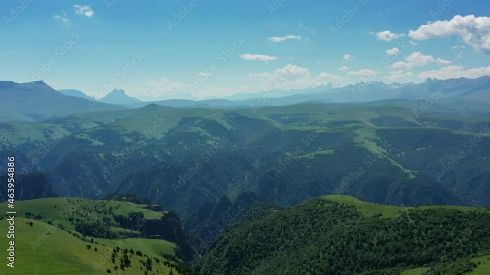 Aerial view of mountain landscape with green hills in Kabardino-Balkaria, Caucasus, Russia, 4k Aerial view of mountain landscape with green hills in Kabardino-Balkaria, Caucasus, Russia, 4k