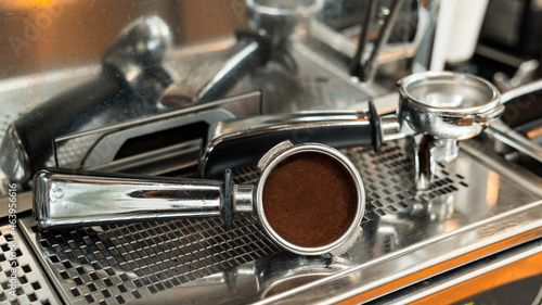 coffee tamper to the coffee machine