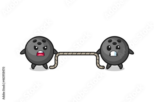 cute bowling character is playing tug of war game