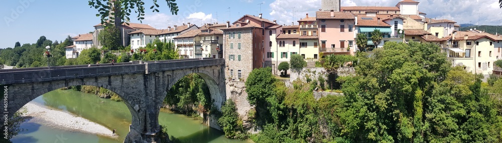 Old bridge Ponte del diavolo over Natisone river in Cividale del Friuli - medieval town in Italy, Friuli