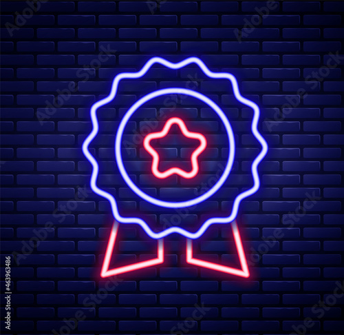 Glowing neon line Medal with star icon isolated on brick wall background. Winner symbol. Colorful outline concept. Vector