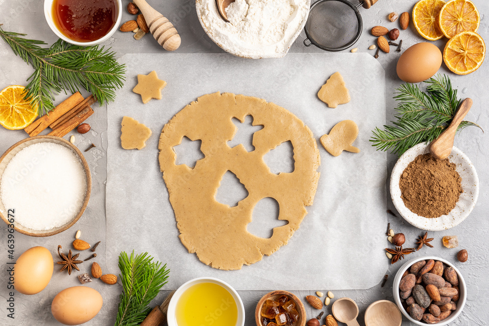 Ingredients for cooking Christmas baking and gingerbread cookies on a wooden background, topview. New Year, holidays, holidays. Ingredients for cooking Christmas baking and gingerbread cookies on a wooden background, topview. New Year, holidays, holidays.