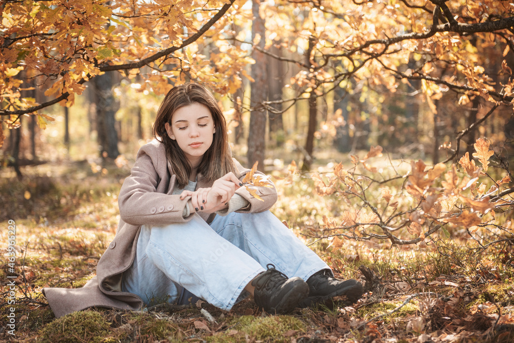 Young teenager girl in the autumn forest Young teenager girl in the autumn forest