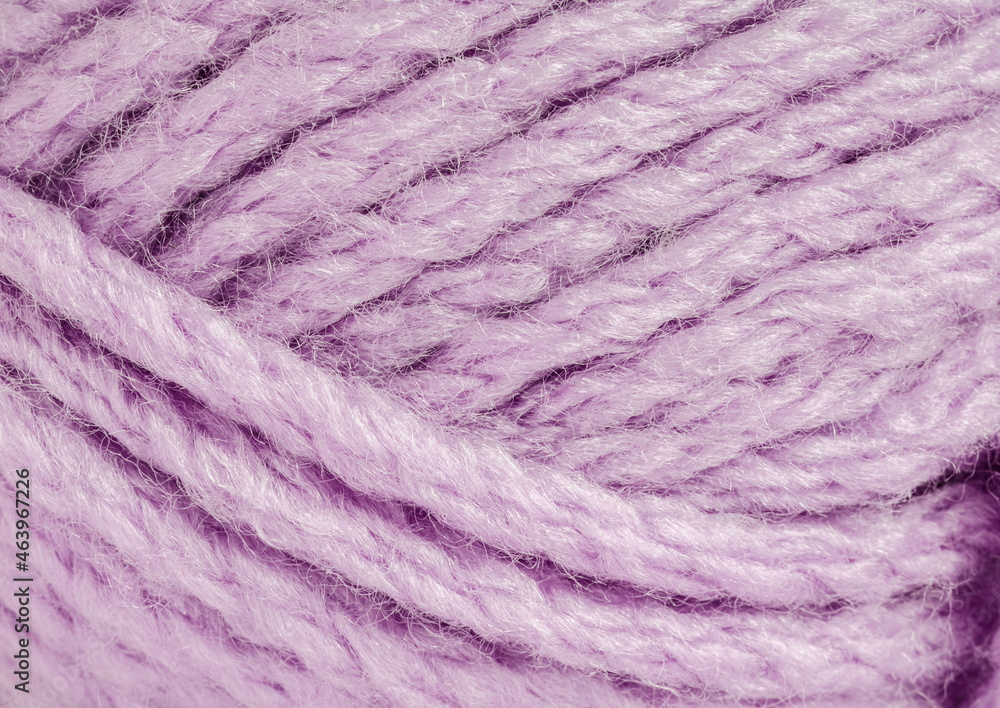 A thread of lavender-colored yarn. Close-up A thread of lavender-colored yarn. Close-up